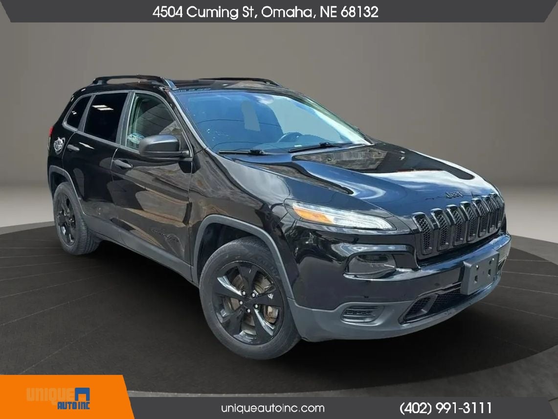 2017 Jeep Cherokee Sport in Diamond Black Crystal Pearlcoat — front three-quarter view