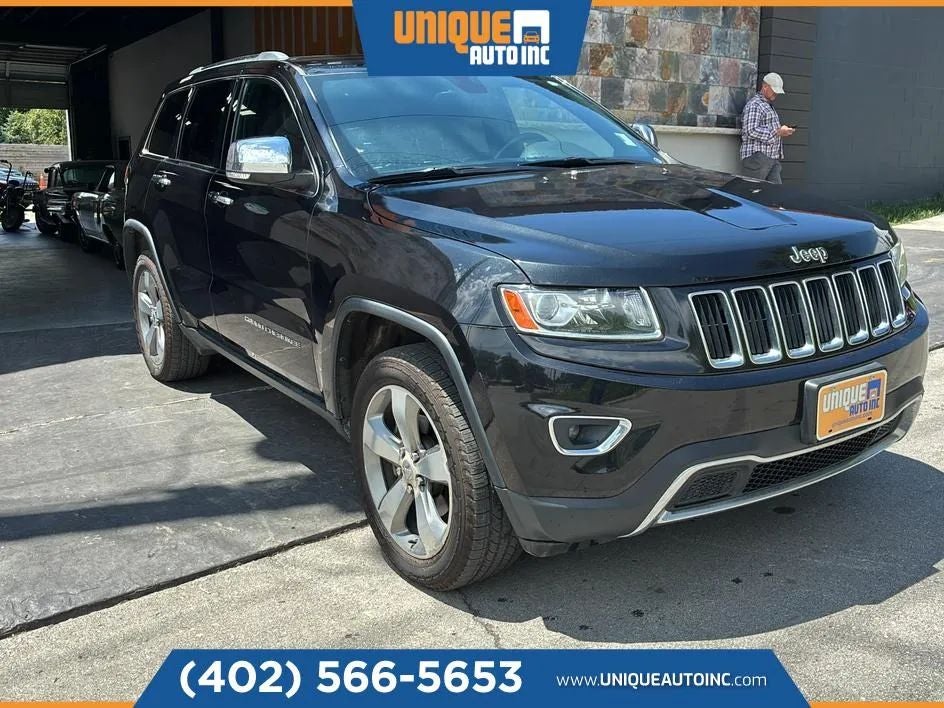 2014 Jeep Grand Cherokee Limited in Brilliant Black Crystal Pearlcoat — front three-quarter view