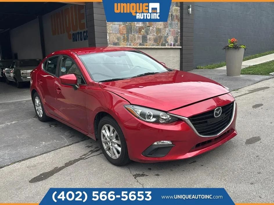 2016 Mazda Mazda3 i Sport in Soul Red Metallic — front three-quarter view