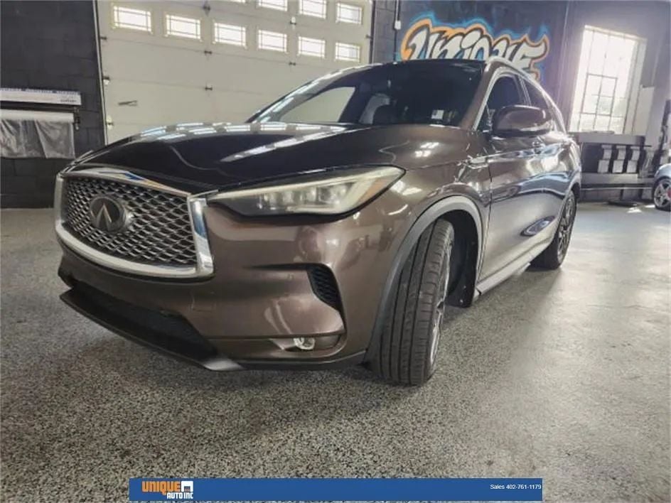 2019 INFINITI QX50 ESSENTIAL in Chestnut Bronze — front three-quarter view